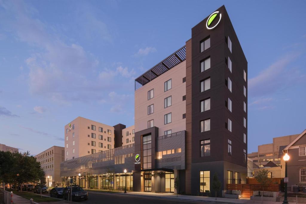 a tall building with a clock on top of it at Element Denver Downtown East in Denver