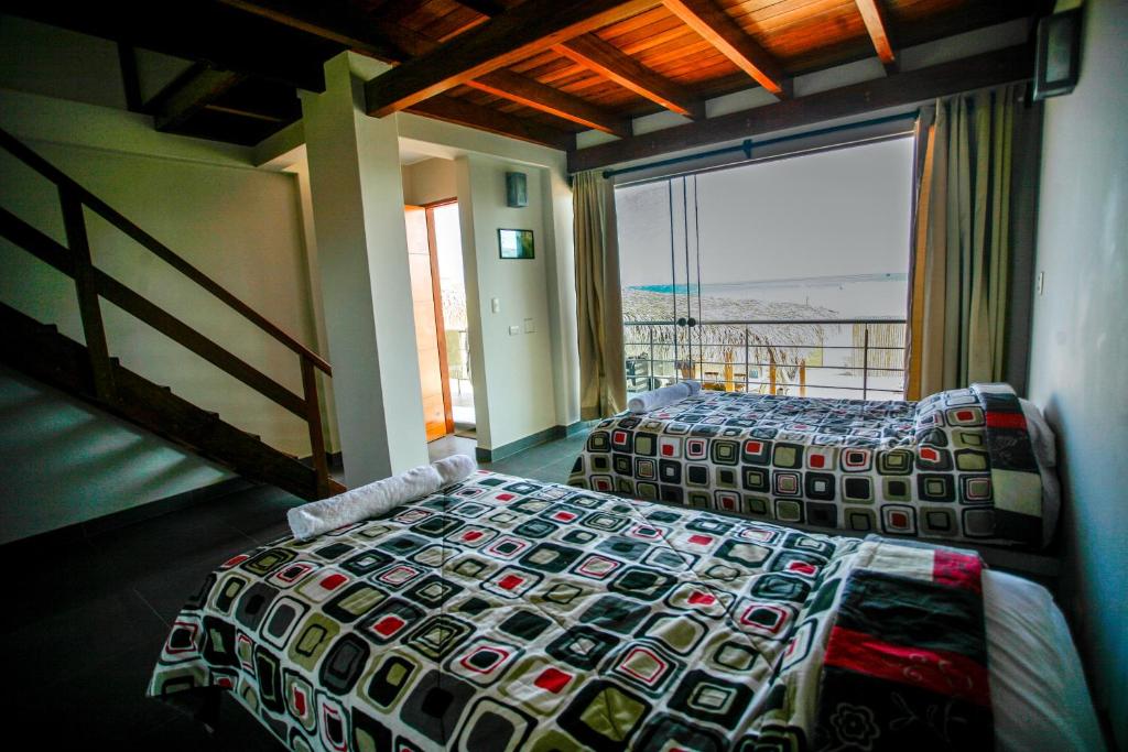 Postel nebo postele na pokoji v ubytování El Hueco Villas