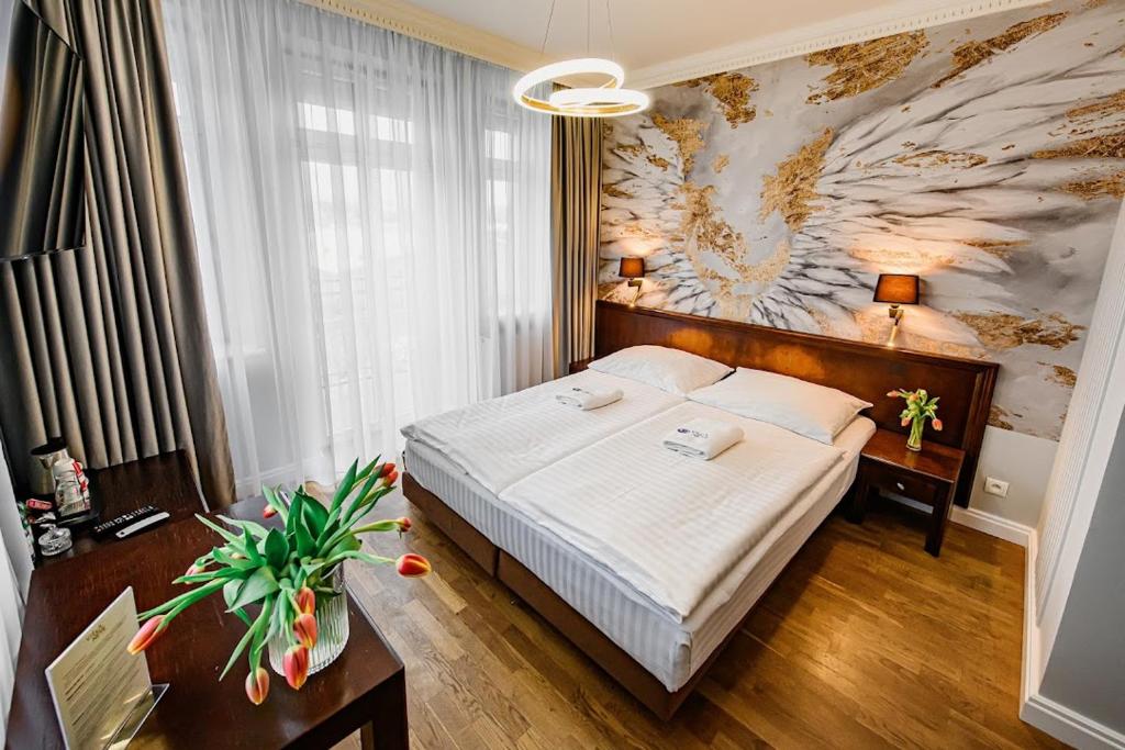 Posteľ alebo postele v izbe v ubytovaní Villa Neve