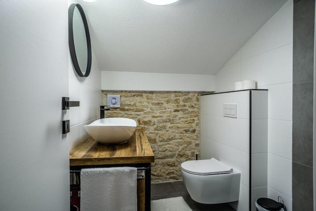 Łazienka w obiekcie Kutić in Štokovci (Haus für 10-15 Personen)