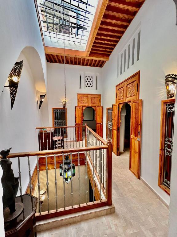 a large room with a ceiling with a skylight at Riad Dar Hanae in Tétouan
