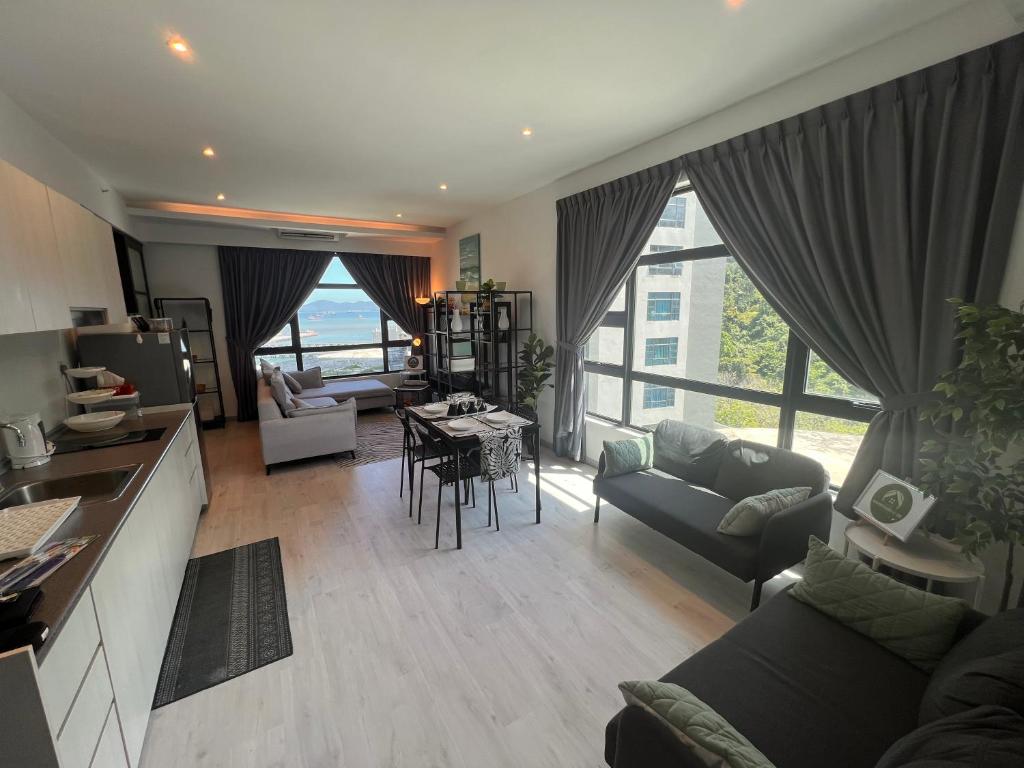 Posezení v ubytování Jesselton Quay Suite by Backyard