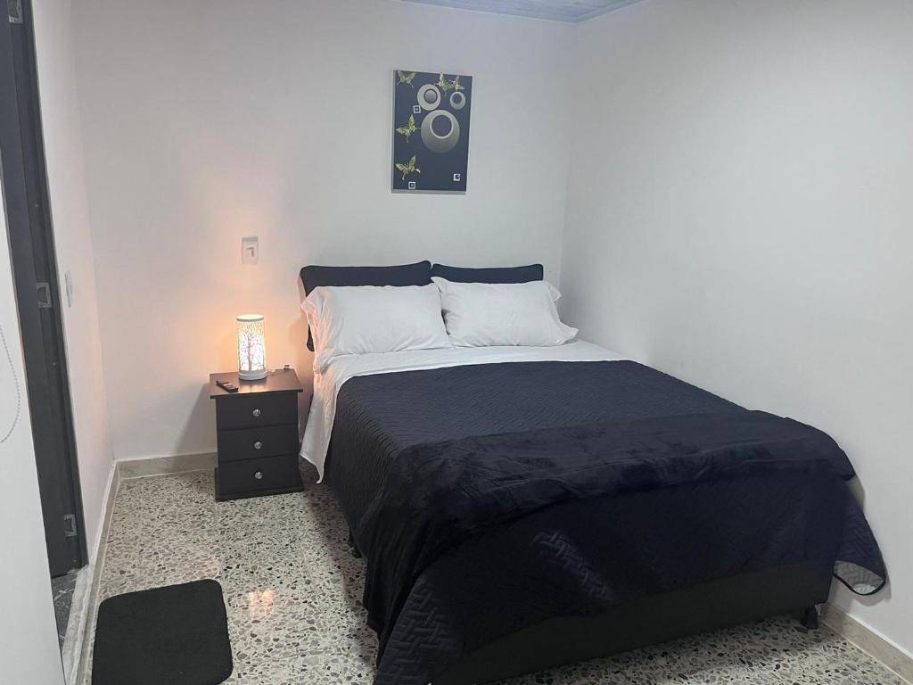 Postel nebo postele na pokoji v ubytování Edificio SantaMarta Medellín
