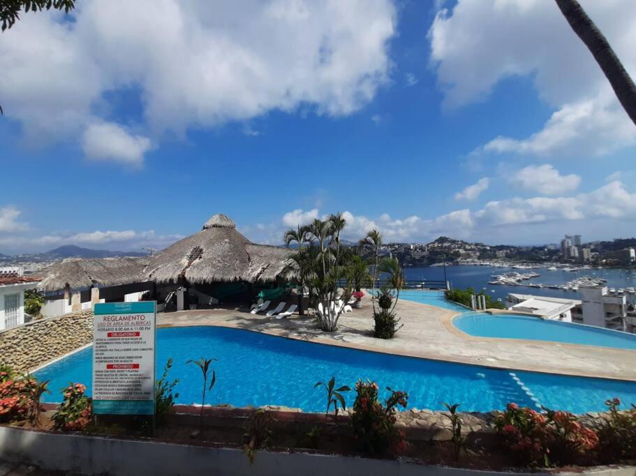 Departamento en Grand Casa Blanca Acapulco 내부 또는 인근 수영장