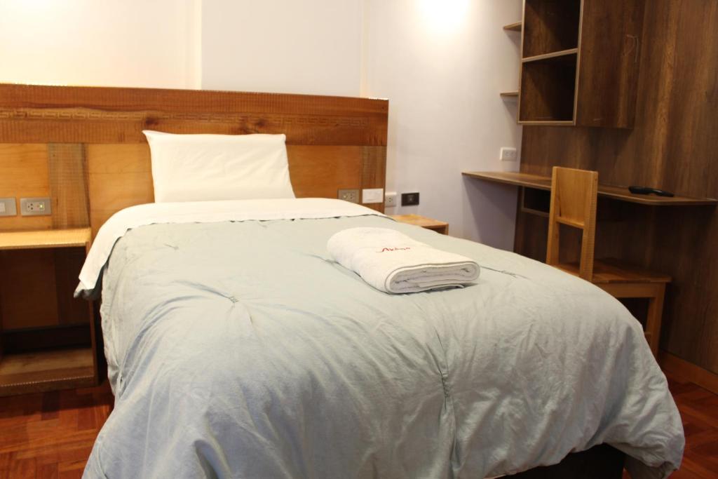 Postel nebo postele na pokoji v ubytování Akilpo Home