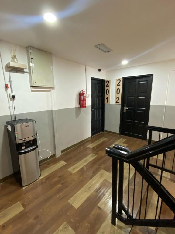 Kuchyň nebo kuchyňský kout v ubytování V Hotel Johor Bahru