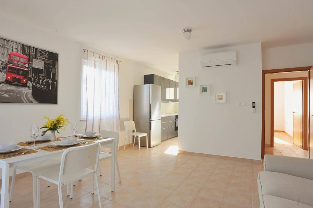 Kuchyň nebo kuchyňský kout v ubytování Apartments Barbara Sutivan