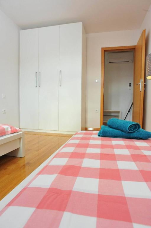 Postel nebo postele na pokoji v ubytování Apartments Barbara Sutivan