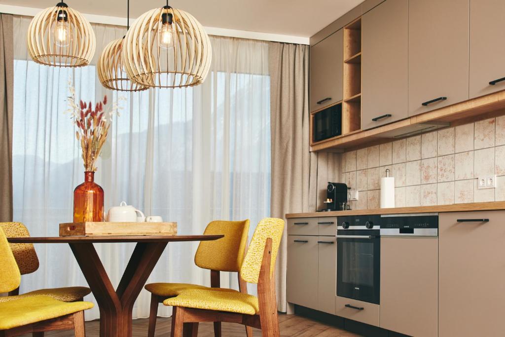 Kuchyň nebo kuchyňský kout v ubytování HOMEBOUND APARTMENTS Bad Goisern - contactless check-in