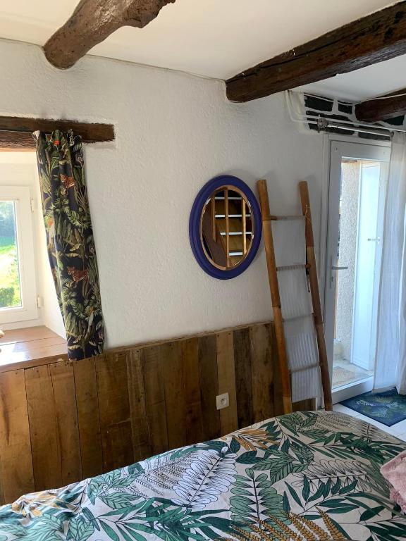 Postel nebo postele na pokoji v ubytování Gîte La Valette d'Aurore - animaux bienvenus