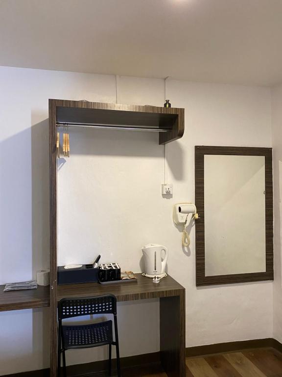 Kuchyň nebo kuchyňský kout v ubytování V Hotel Johor Bahru