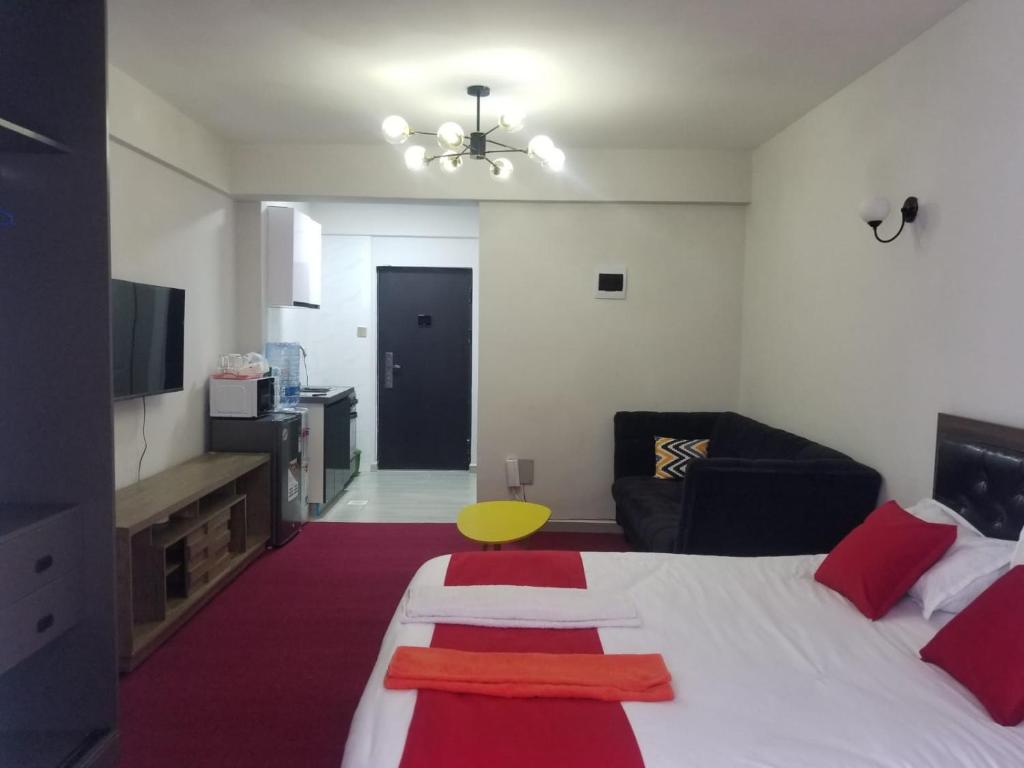 Ένα ή περισσότερα κρεβάτια σε δωμάτιο στο Jeyem HomeStays Studio B1202 at Diamond Homes Apartment