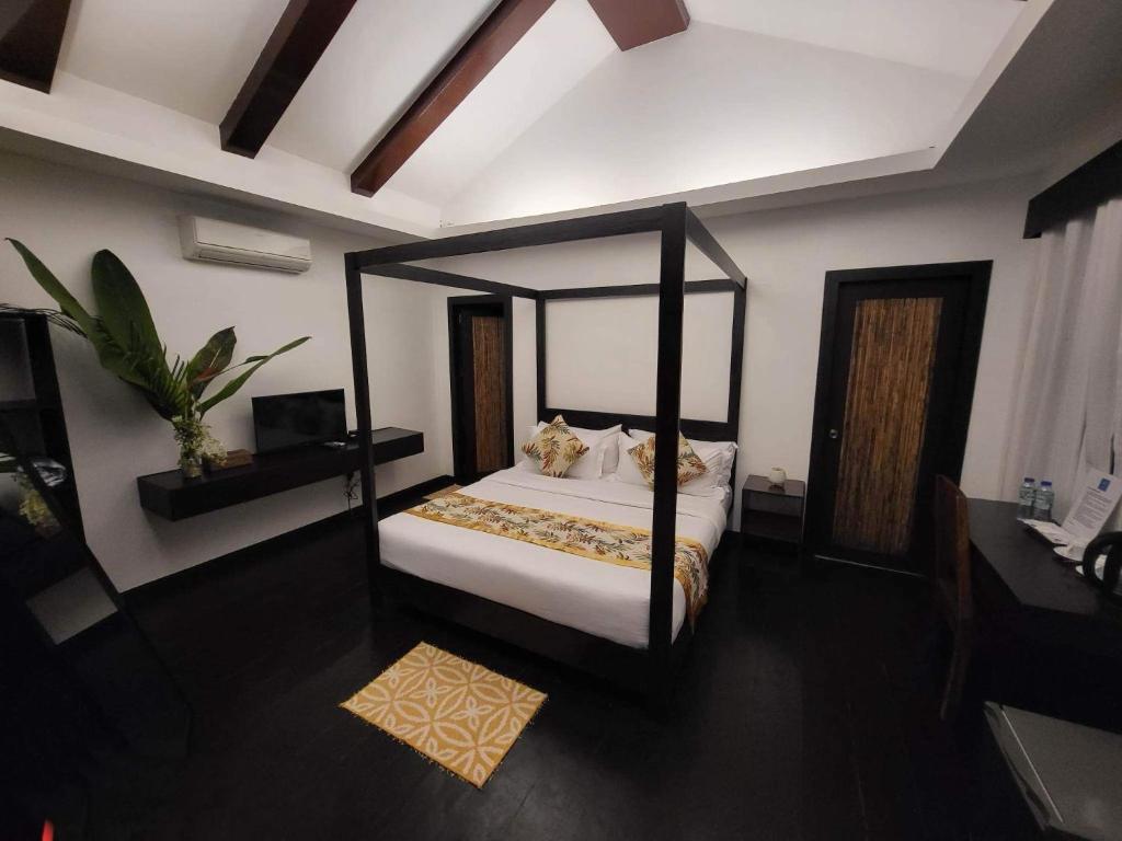 Postel nebo postele na pokoji v ubytování Lio Villas Resort