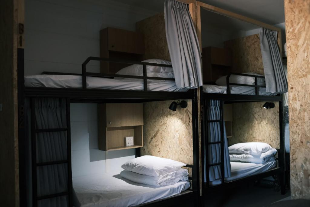 Postel nebo postele na pokoji v ubytování A Forest Homestay