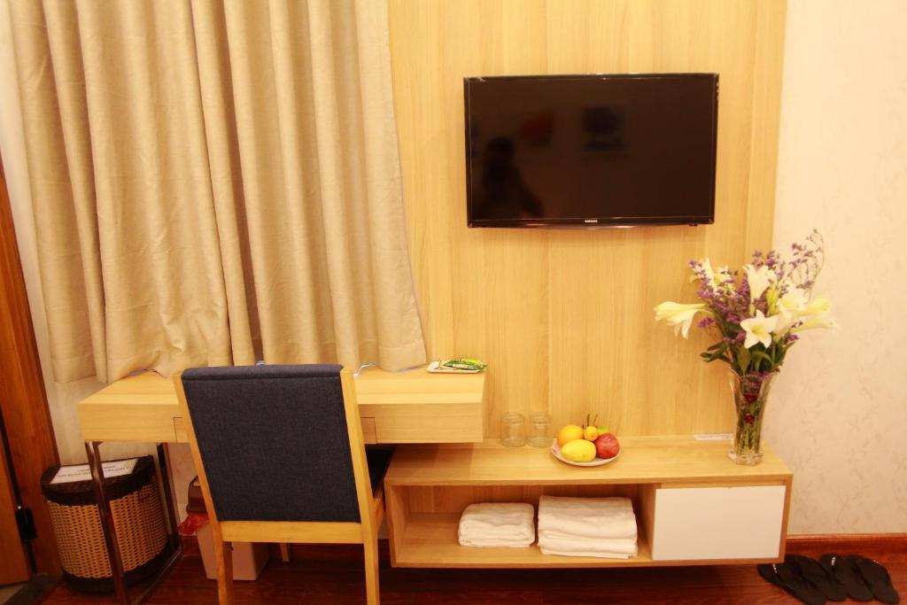 TV/trung tâm giải trí tại Little Nha Trang Hotel