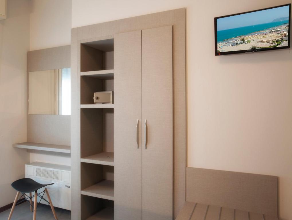 TV a/nebo společenská místnost v ubytování Hotel Norma