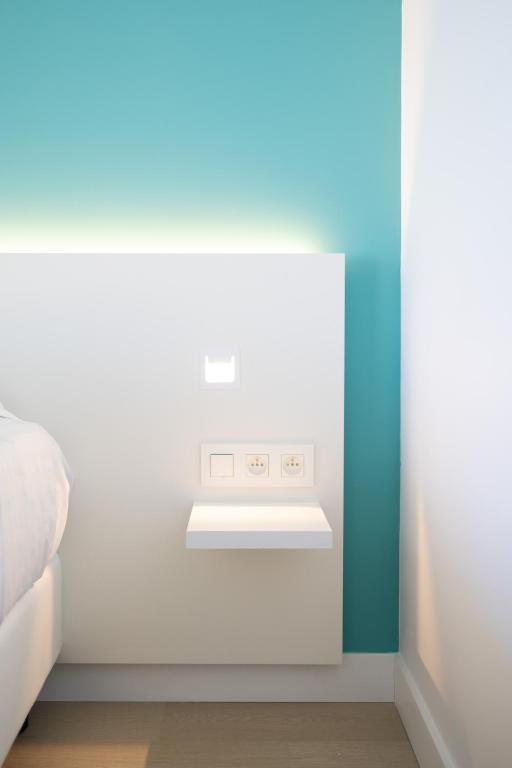 Krevet ili kreveti u jedinici u objektu Hôtel Riva Art & Spa