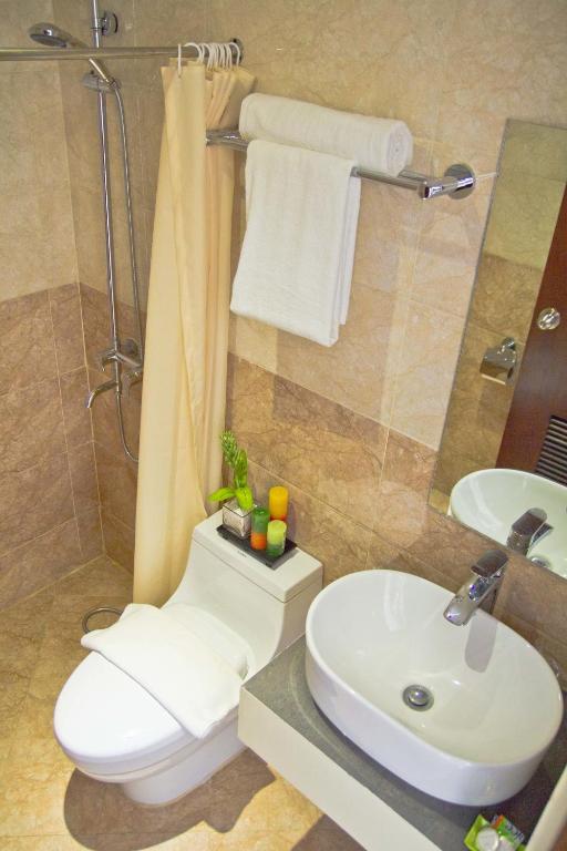 Koupelna v ubytování Canberry Hotel