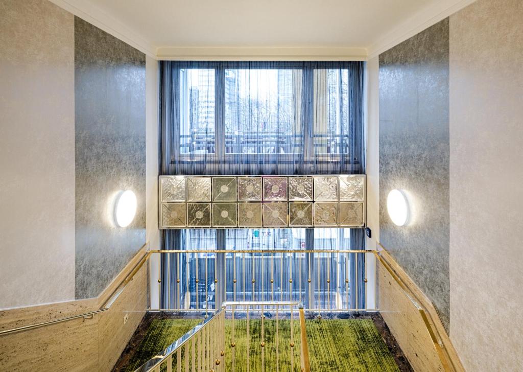Posteľ alebo postele v izbe v ubytovaní Hotel Capricorno
