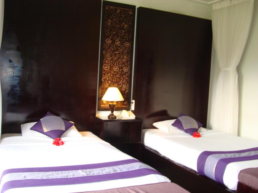 Postel nebo postele na pokoji v ubytování Anini Raka Resort & Spa