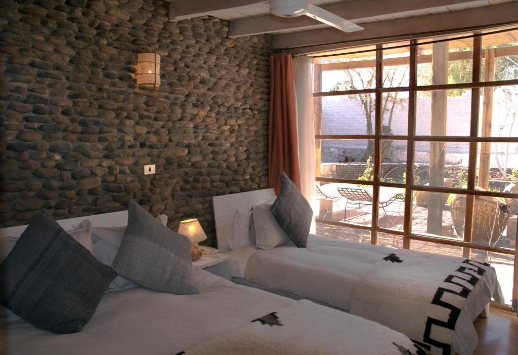 Postel nebo postele na pokoji v ubytování Terrantai Lodge