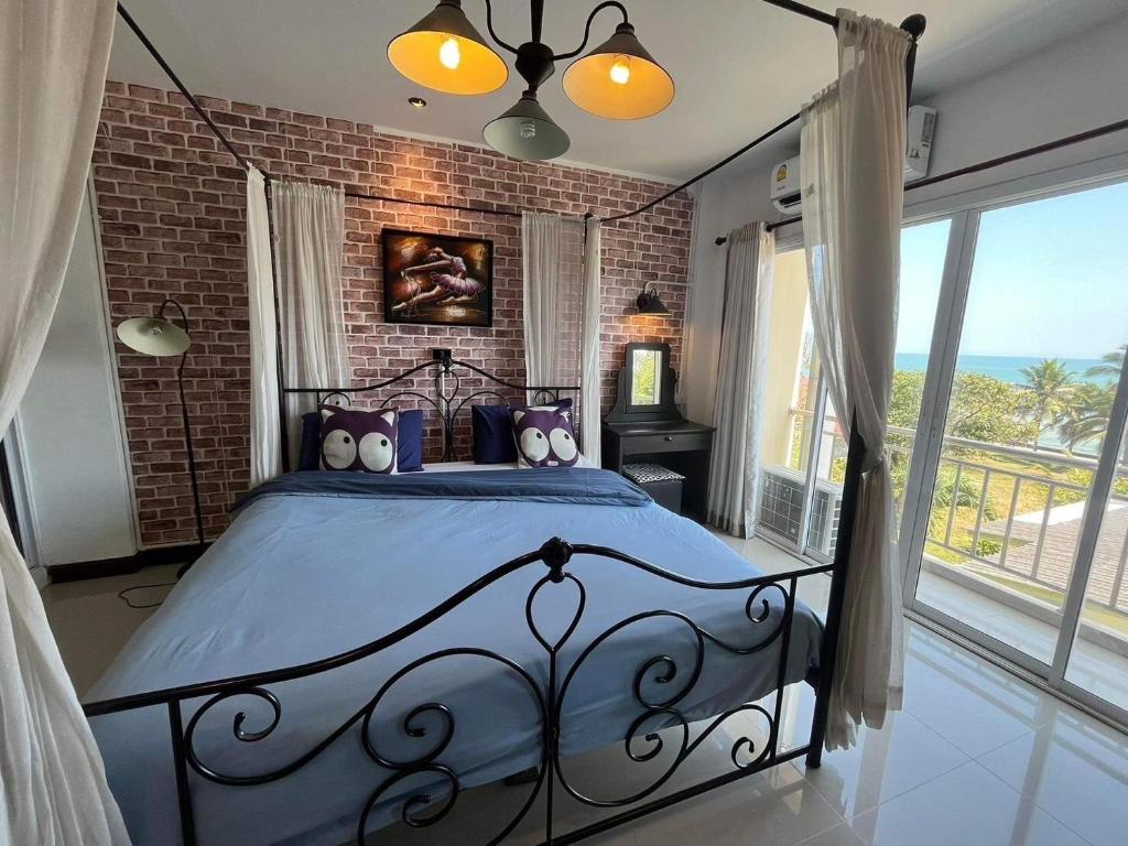 Postel nebo postele na pokoji v ubytování Mooz Huahin Bed & Breakfast