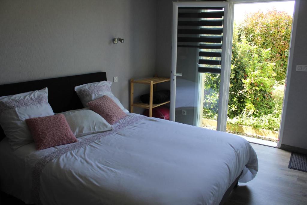 Posteľ alebo postele v izbe v ubytovaní B&B La Lyre