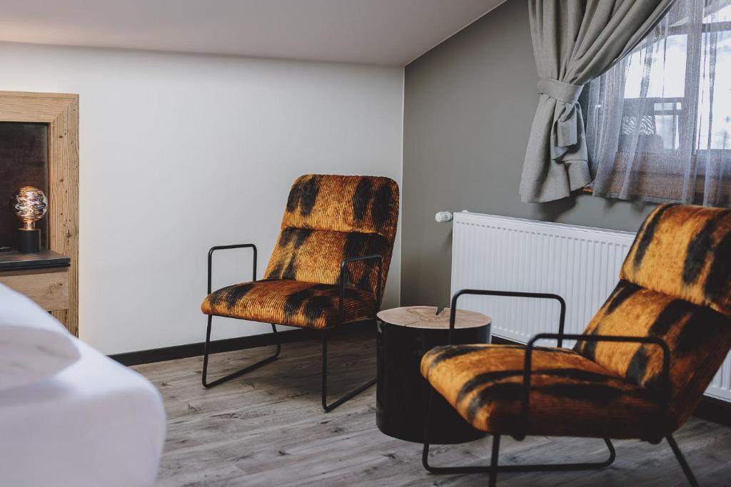 Posezení v ubytování POST POST Hotel - Alpine Boutique Hotel & Spa