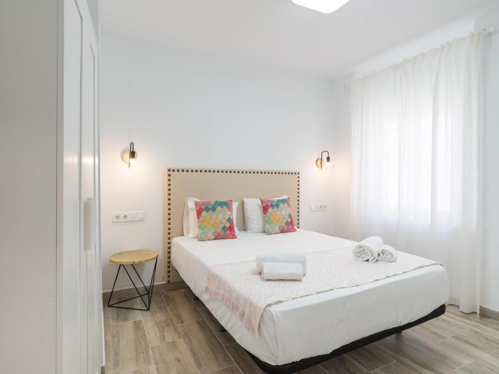 Posteľ alebo postele v izbe v ubytovaní Preciosa Casa Terraza Privada 2hab 2baños AC