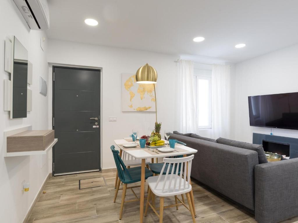 Televízia a/alebo spoločenská miestnosť v ubytovaní Preciosa Casa Terraza Privada 2hab 2baños AC