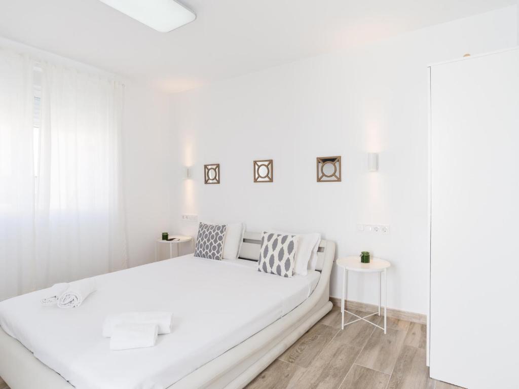 Posteľ alebo postele v izbe v ubytovaní Preciosa Casa Terraza Privada 2hab 2baños AC