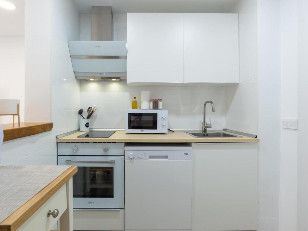 Kuchyňa alebo kuchynka v ubytovaní Preciosa Casa Terraza Privada 2hab 2baños AC