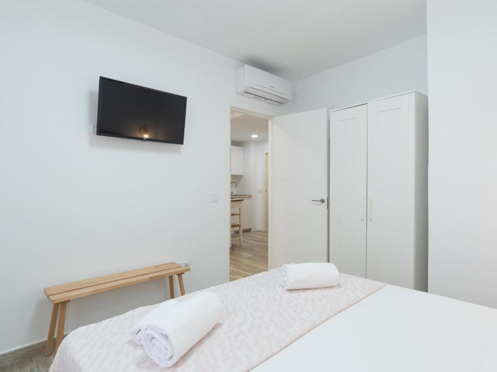 Posteľ alebo postele v izbe v ubytovaní Preciosa Casa Terraza Privada 2hab 2baños AC