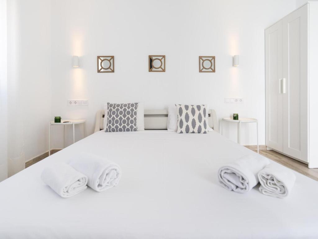 Posteľ alebo postele v izbe v ubytovaní Preciosa Casa Terraza Privada 2hab 2baños AC