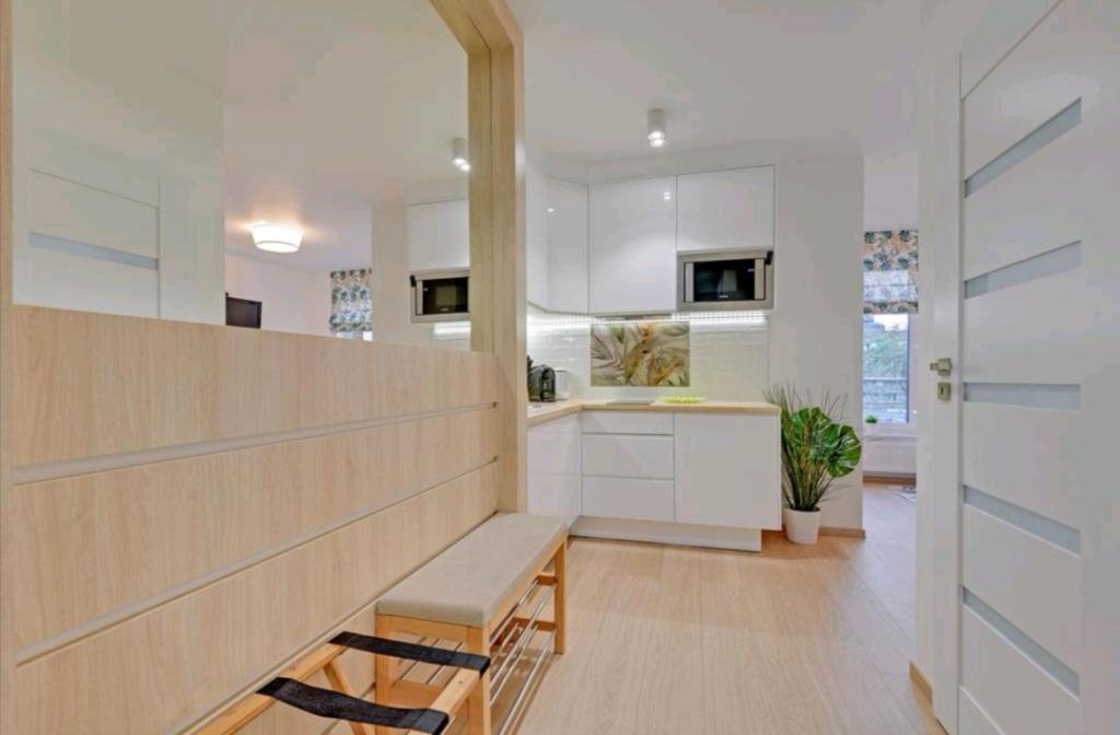 Kuchyňa alebo kuchynka v ubytovaní Apartament Gdańsk Śródmieście Tartaczna 42