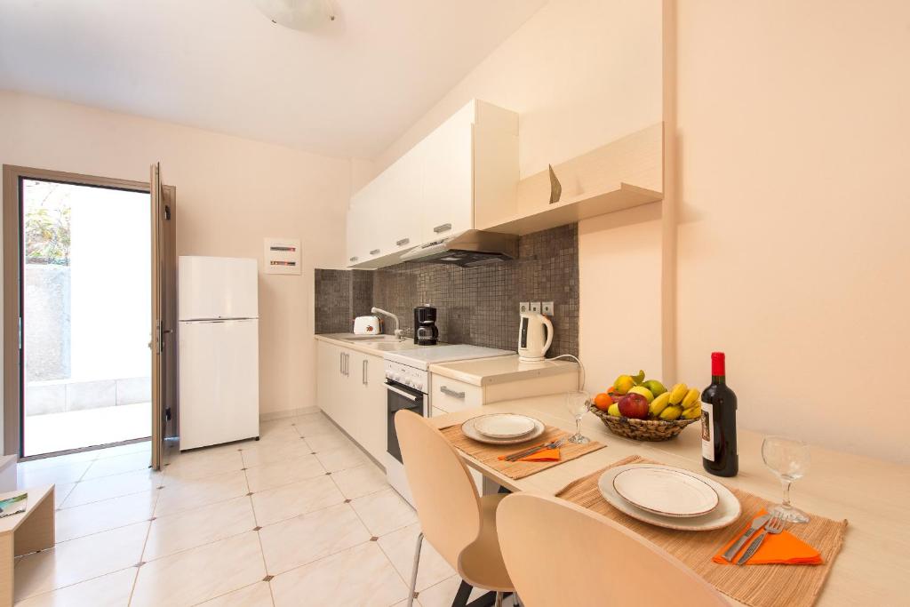 Kuchyň nebo kuchyňský kout v ubytování Renata's Villas