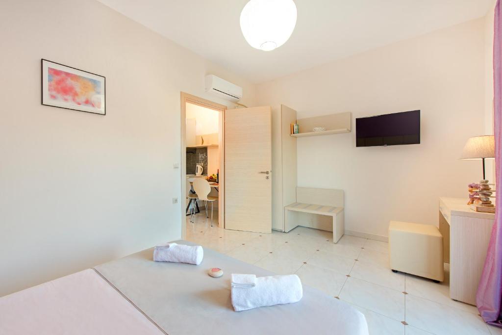 Postel nebo postele na pokoji v ubytování Renata's Villas