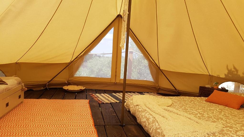 Postel nebo postele na pokoji v ubytování Sublim' Ecolodge