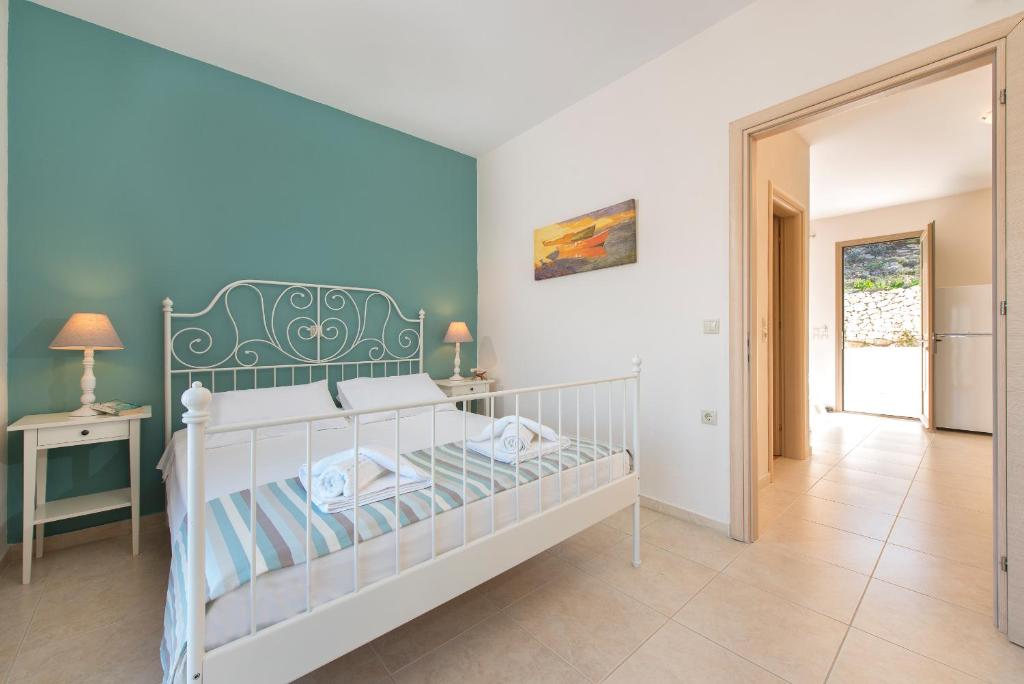 Postel nebo postele na pokoji v ubytování Renata's Villas