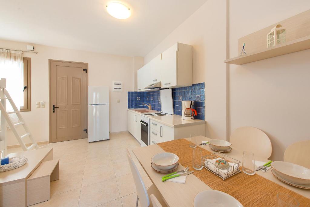 Kuchyň nebo kuchyňský kout v ubytování Renata's Villas