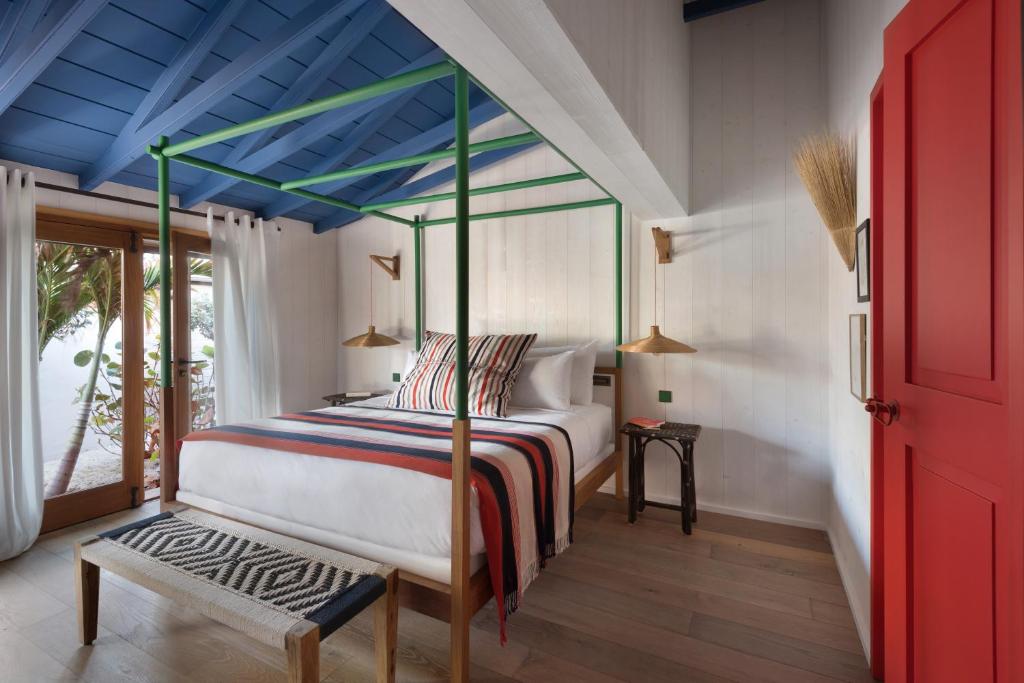 Postel nebo postele na pokoji v ubytování Hotel Manapany