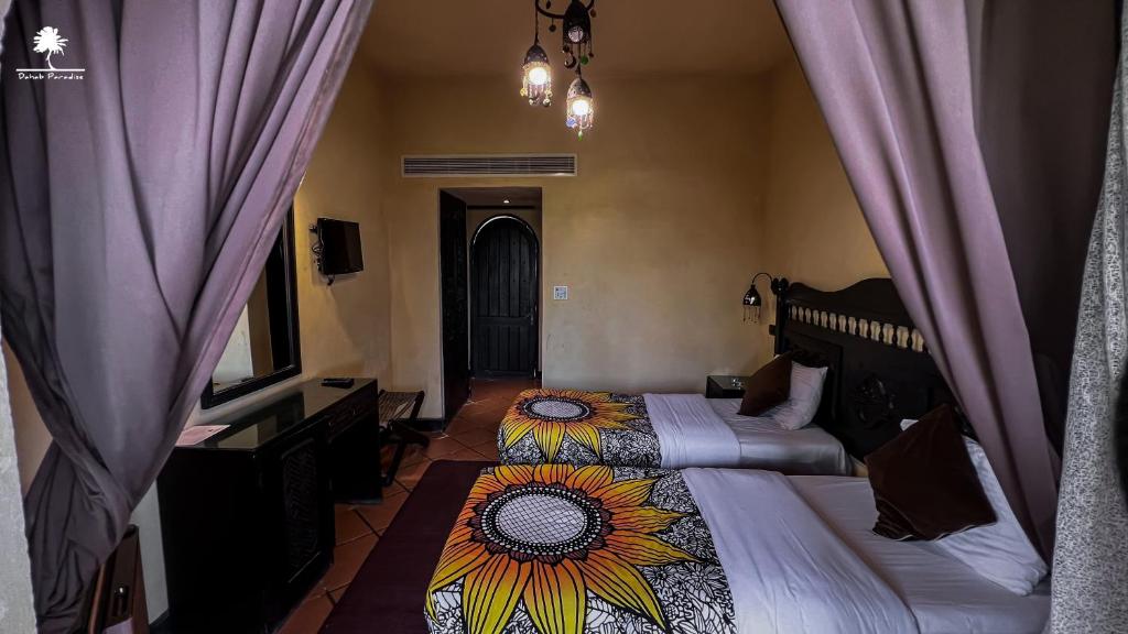 Postel nebo postele na pokoji v ubytování Dahab Paradise