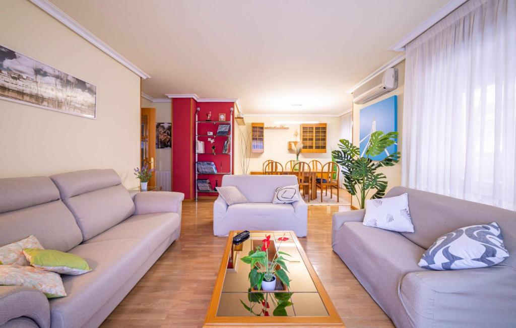 a living room with two couches and a table at Lope de Vega in Zamora