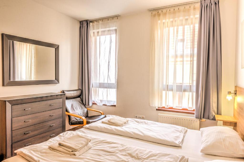 Posteľ alebo postele v izbe v ubytovaní Budapest Center Apartments