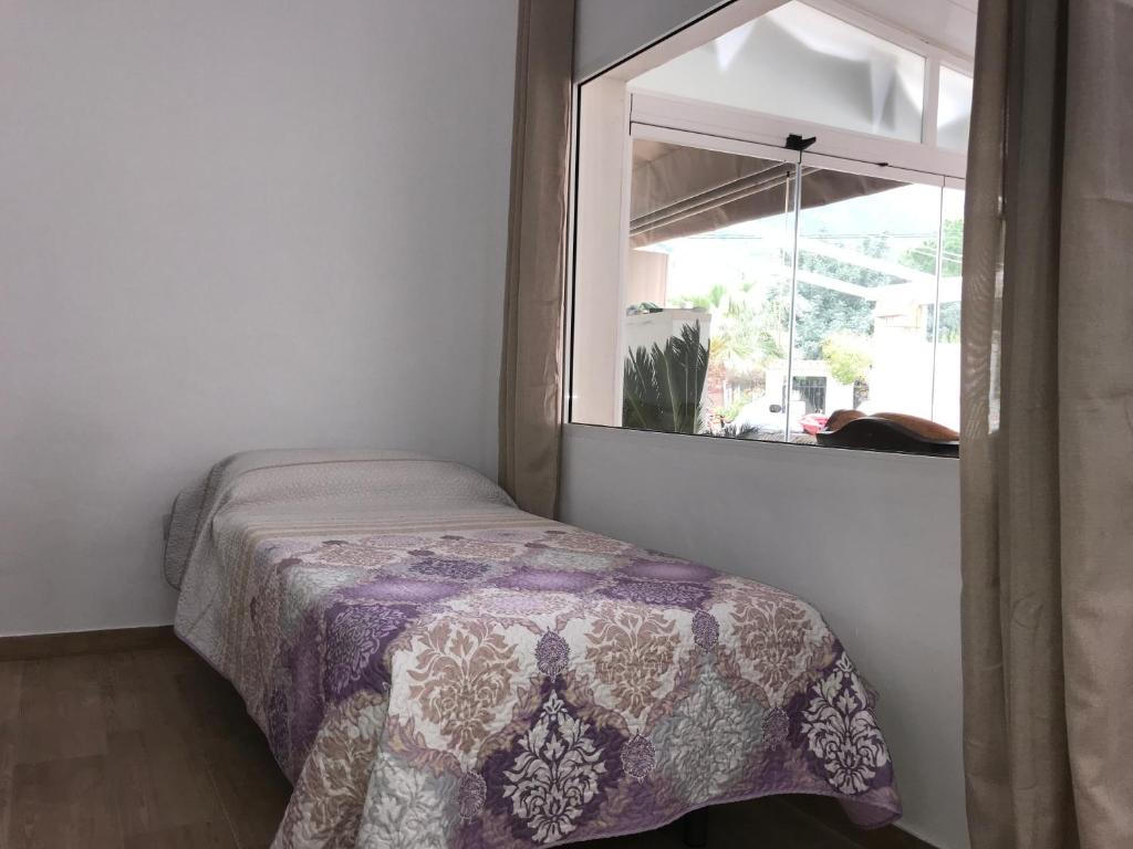 Postel nebo postele na pokoji v ubytování Casa Raíces del Montgo