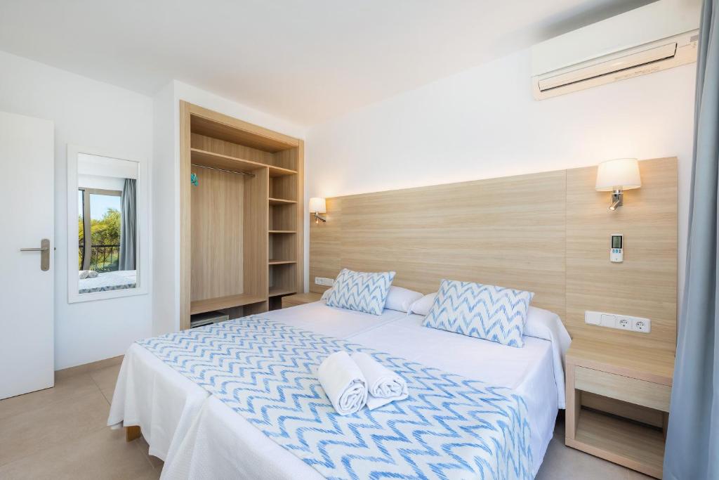 Postel nebo postele na pokoji v ubytování Apartamento Aquamarina 5