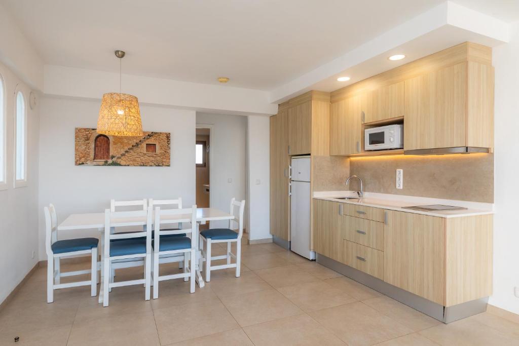 Kuchyň nebo kuchyňský kout v ubytování Apartamento Aquamarina 5