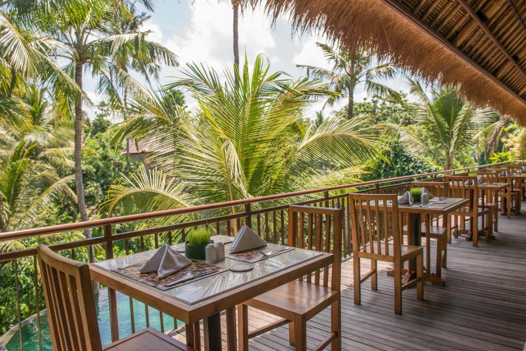 Balkón nebo terasa v ubytování Komaneka at Rasa Sayang Ubud