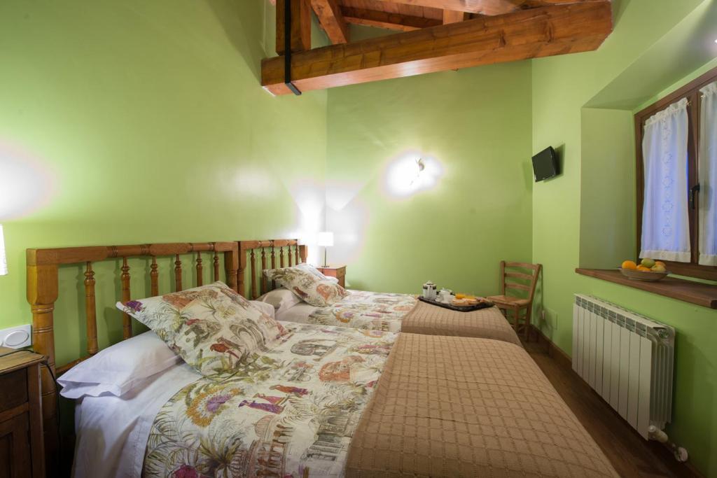 Postel nebo postele na pokoji v ubytování Ekolanda