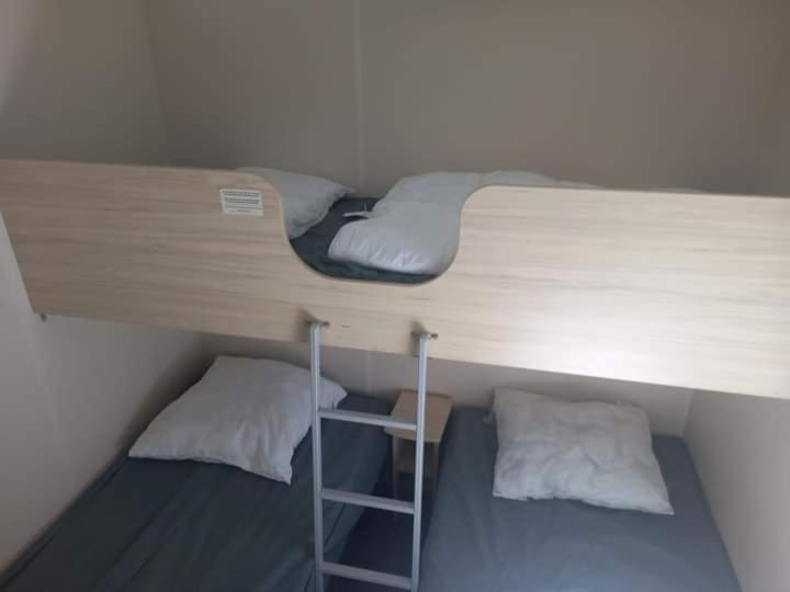 Poschodová posteľ alebo postele v izbe v ubytovaní Famille Peeters
